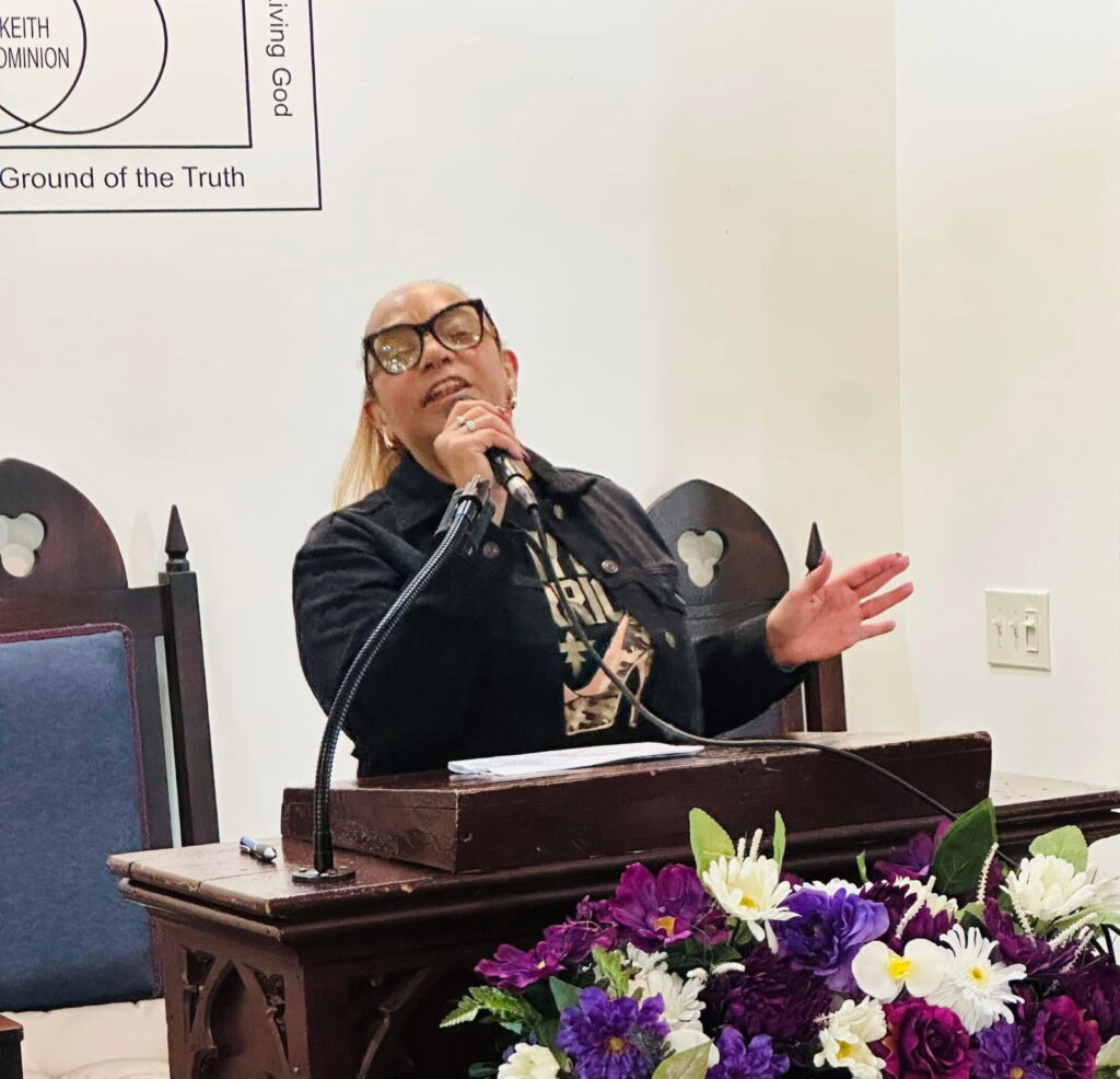 woman speaking for a public event 